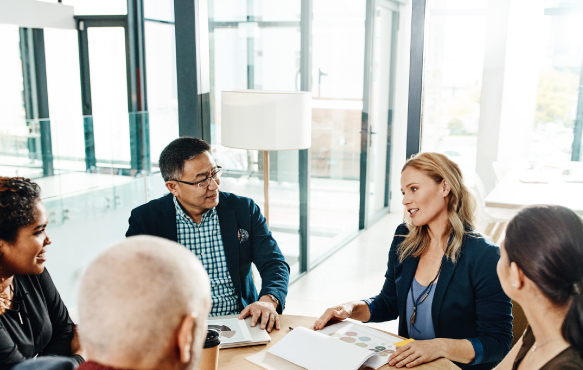 Diverse team sitting in a meeting
